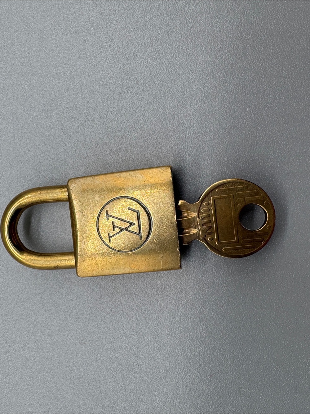 Louis Vuitton vintage Brass Tone Padlock with Key - Gold